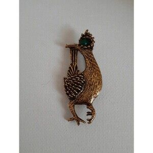 Ambassador signed vintage roadrunner Brooch/pin. Gold tone with green eyes